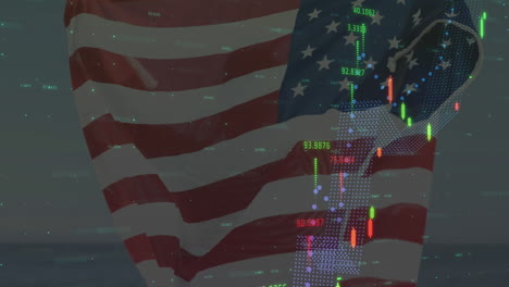 animation of financial data processing over person holding american flag