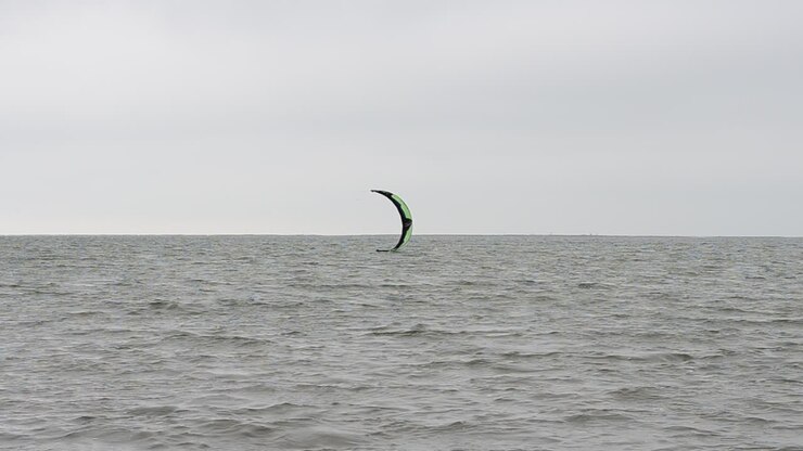 Sea and wind. Driving on a board under a sail