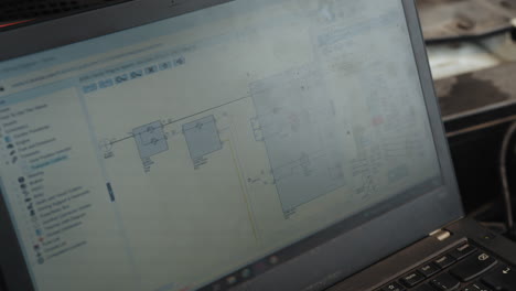 car electrical diagram on laptop
