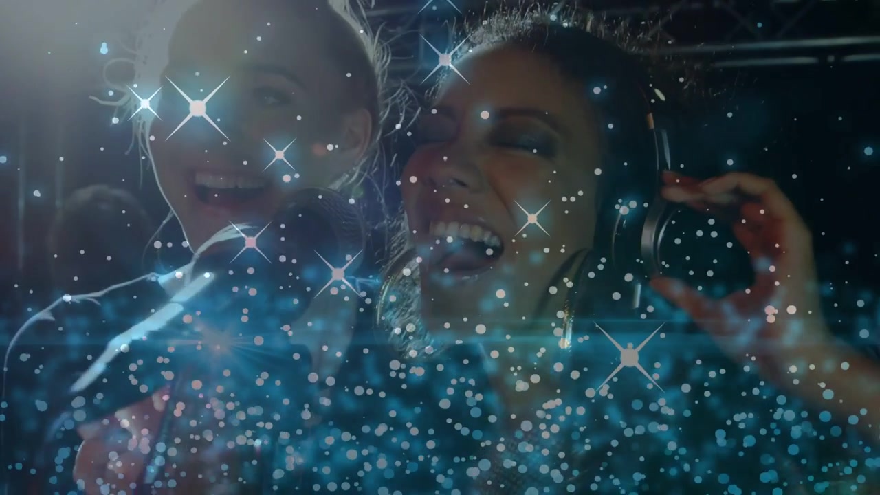 Two female singers cueing duet, adjusting headphones and bringing microphone, blue bokeh overlaying