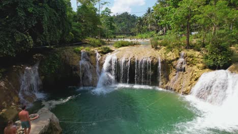 4k drone footage of a couple at pangas falls in bohol, philippines