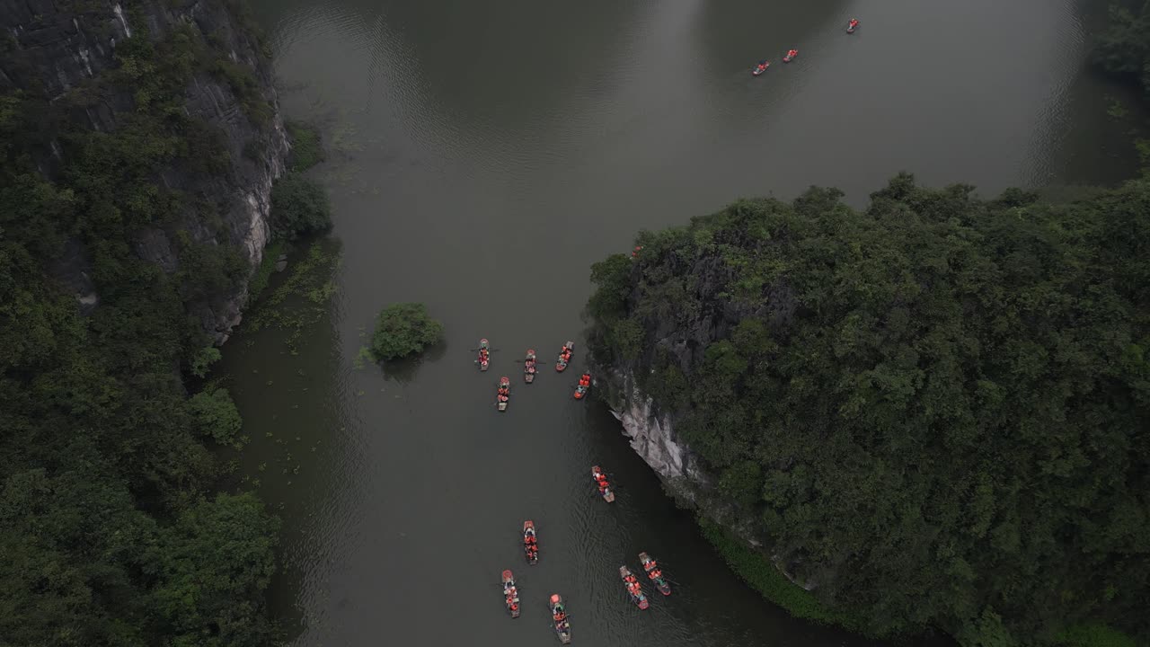 drone shot of river with jagged cliffs in the mountainous region of Ninh Ninh in Northern Vietnam