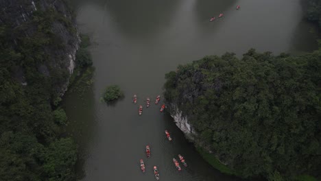 drone shot of river with jagged cliffs in the mountainous region of ninh ninh in northern vietnam
