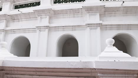 detailed view of temple's white exterior structure