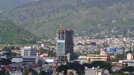 highrise construction in a mountainous city