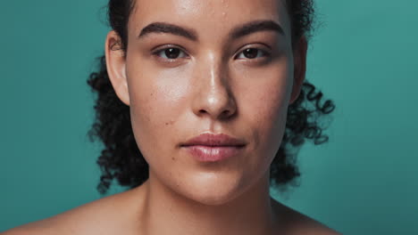 close-up portrait of woman with curly hair