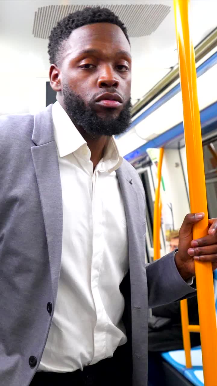 Man in Suit on Subway