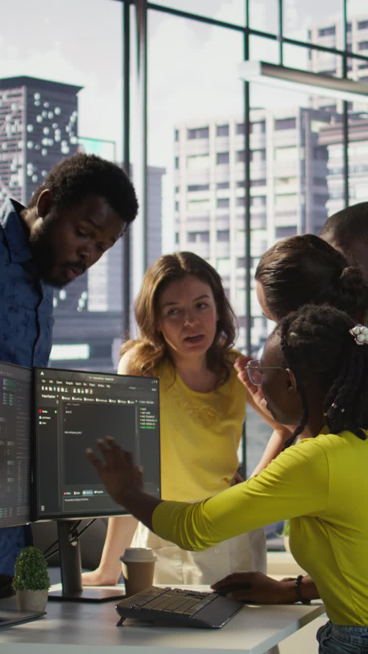Vertical video Team of programmers fighting in office while checking code, having disagreement,