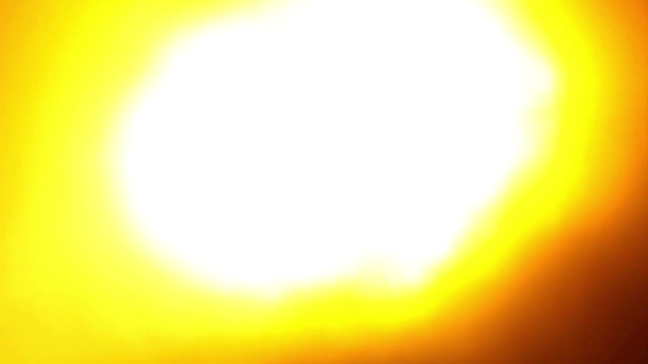 Bright Yellow and Orange Light Leak Transition