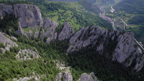 spiked rock formation, aerial drone shot in dolomites