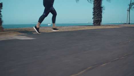 runner, woman and street by ocean for fitness