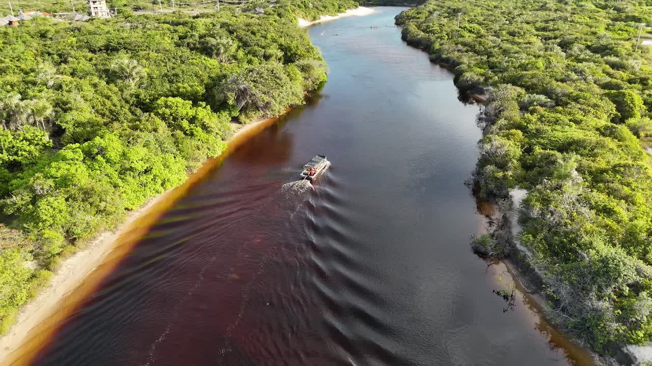 Boat Sailing At Santo Amaro In Maranhao Brazil. Beautiful Ecosystem. Bay Water Landscape. Boat Sailing In Maranhao. Dark River. Native Village. Tourism Travel. Brazil Northeast