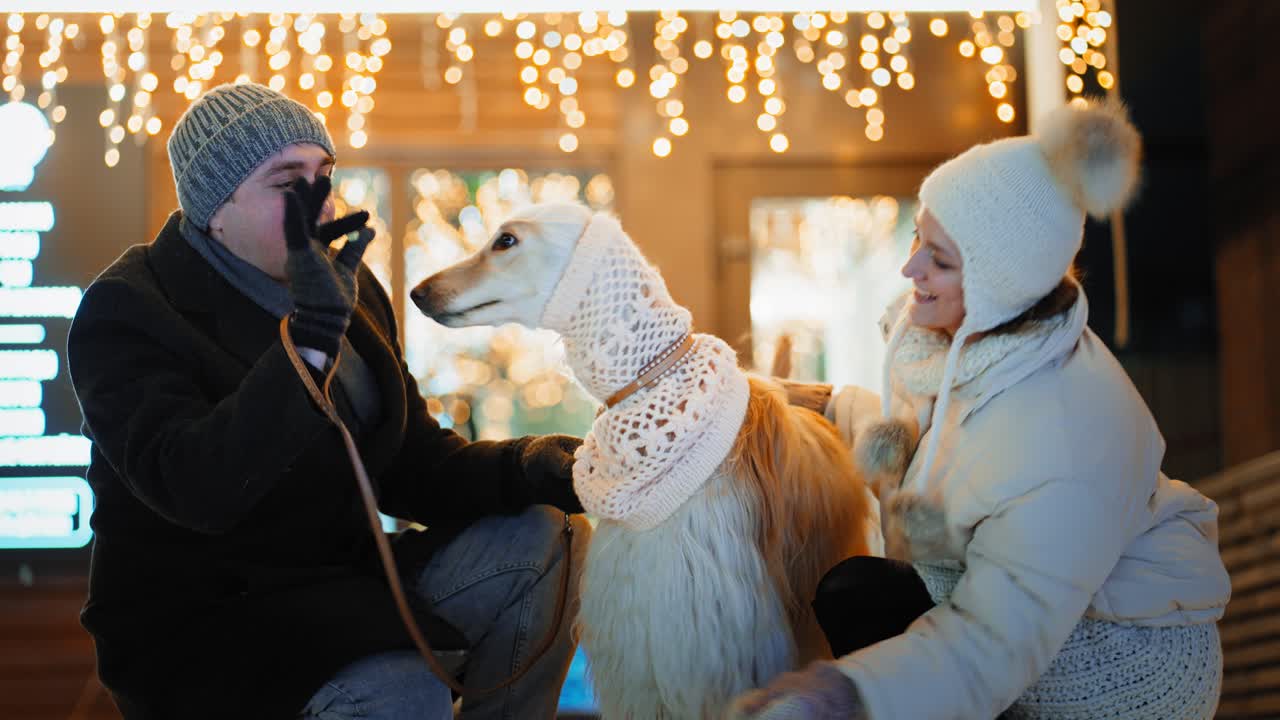 Couple with their Dog in Winter City