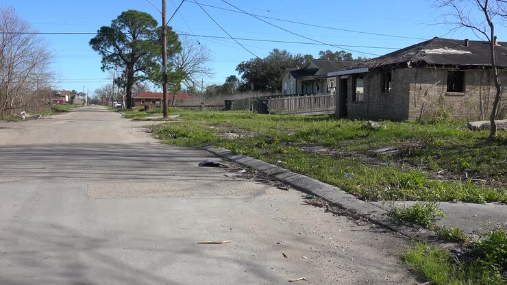 Houses stand amidst empty and undeveloped lots in the Lower 9th Ward of New Orleans Louisiana post Katrina