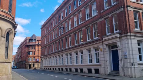 scenic view of stoney street and broadway corner in nottingham’s lace market, highlighting historic architecture on a calm, sunny summer morning in the city center, uk