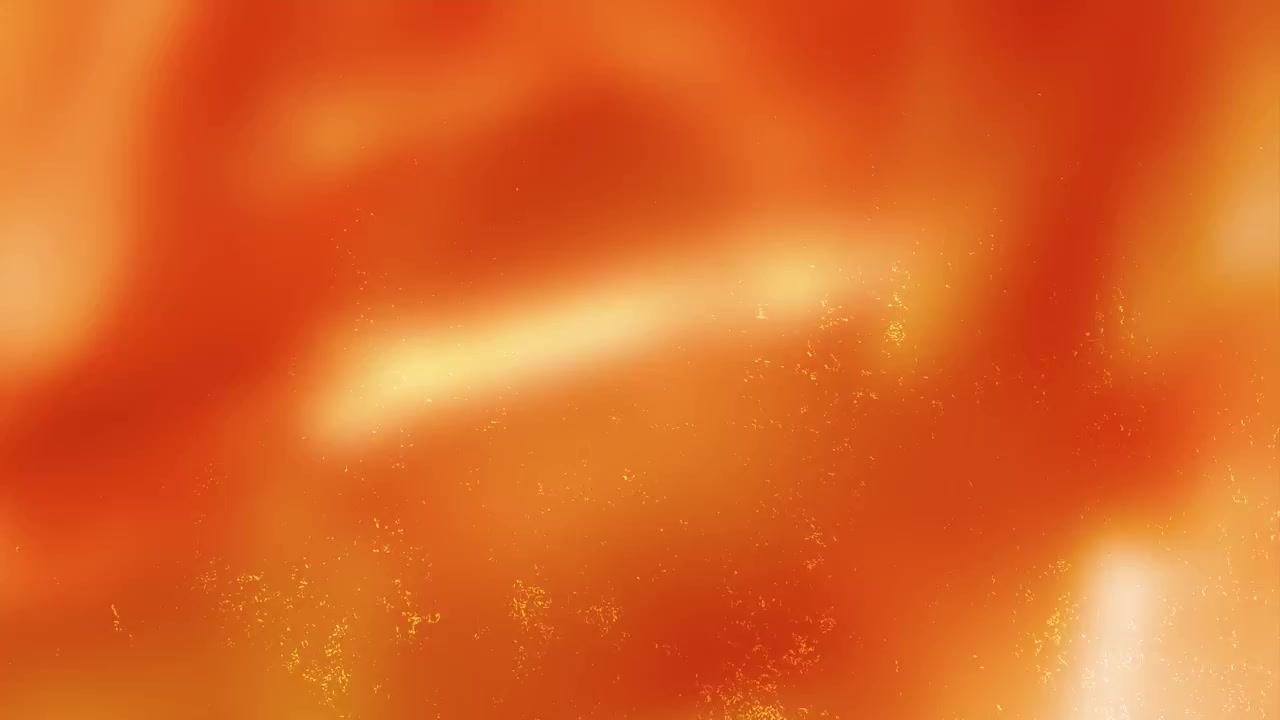 光る赤とオレンジの光の粒子が舞う抽象的なモーション背景