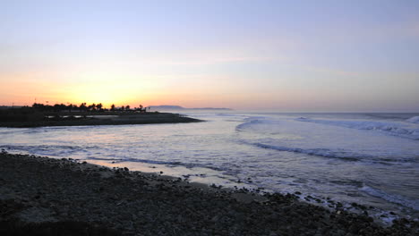 Waves-breaking-at-sunrise-at-Surfers-Point-from-Emma-Woods-State-Beach-in-Ventura-California