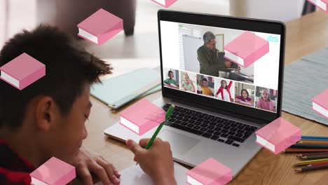 Pink-book-icons-in-seamless-motion-against-asian-boy-doing-homework-while-having-a-video-conference