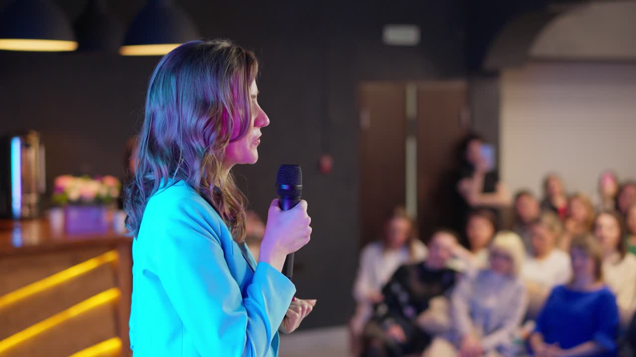 Woman Speaker at a Business Event
