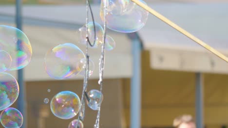 soap bubbles floating in the air in 4k slow motion 60fps