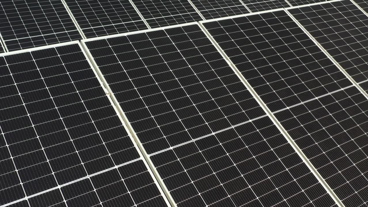 aerial close up shot solar panel at sunlight. Alternative source of energy.4k video