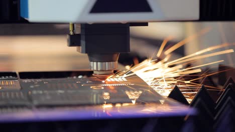 CNC-Laser-cutting-of-metal,-modern-industrial-technology.