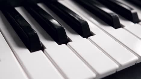 black and white piano keys on the keyboard