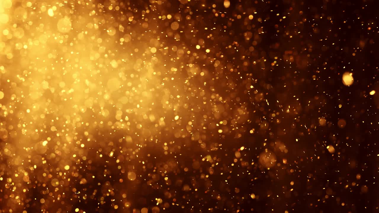 Guld svævende støvpartikler på mørk baggrund. Magiske støvpartikler med elegante bokeh-cirkler. Nytårs- og juleeventyrbaggrund. 4K.