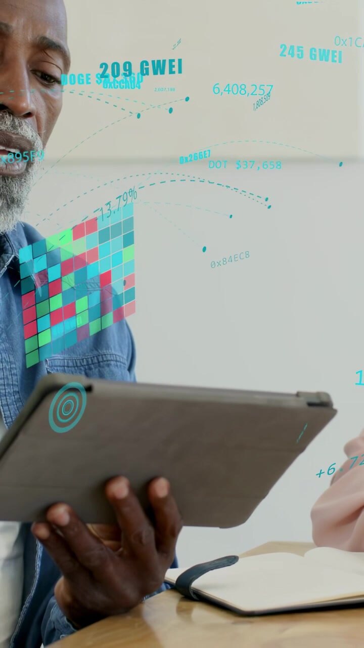 Vertical video: Man tapping tablet tilting, animating tech data grid, numbers and notes for review