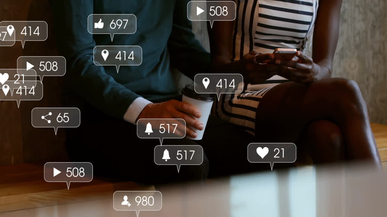 In school, animation of people sitting with social media interaction icons visible
