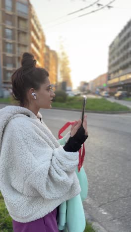 woman using smartphone in the city