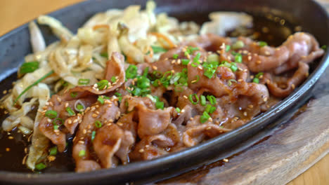 teriyaki pork in hot pan with cabbage - japanese food style