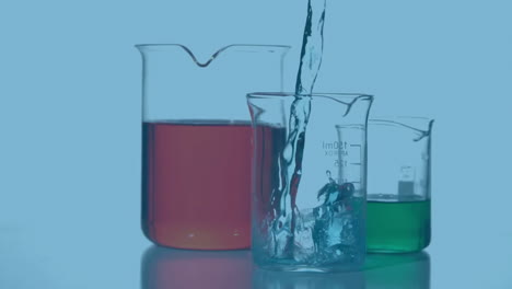 vasos de laboratorio con moléculas en primer plano