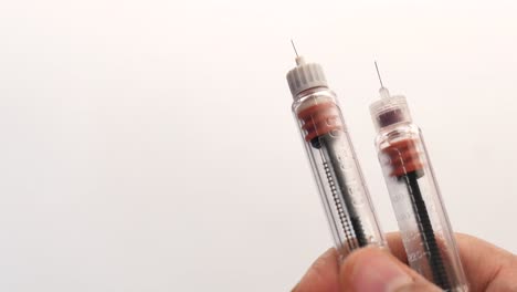 insulin pens: a close-up view of two insulin injection pens