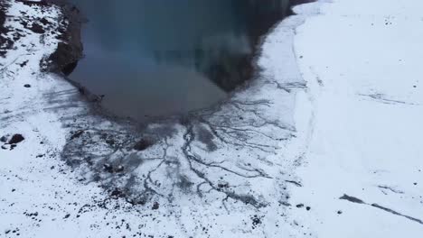 Oeschinensee-lake-in-winter-Switzerland-4K-drone-footage