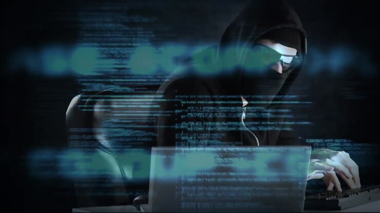 Hacker using computer in dark room with code
