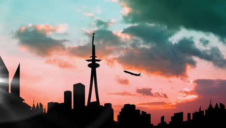 Animation-of-plane-taking-off-over-silhouetted-modern-cityscape-with-clouds-at-sunset-on-blue-sky