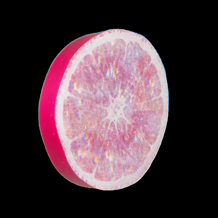 Rotating Pink Glitter Citrus Slice on Black Background
