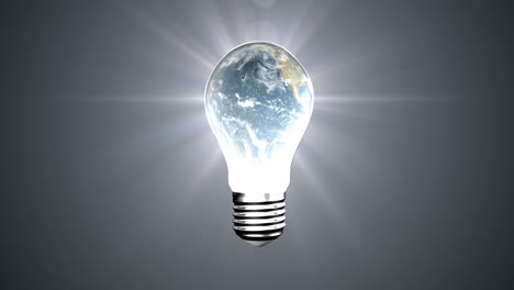 light bulb with revolving earth