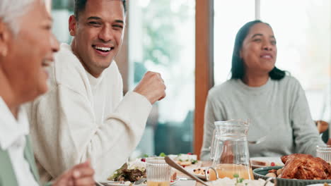 Family,-man-and-women-laughing-with-food-in-house