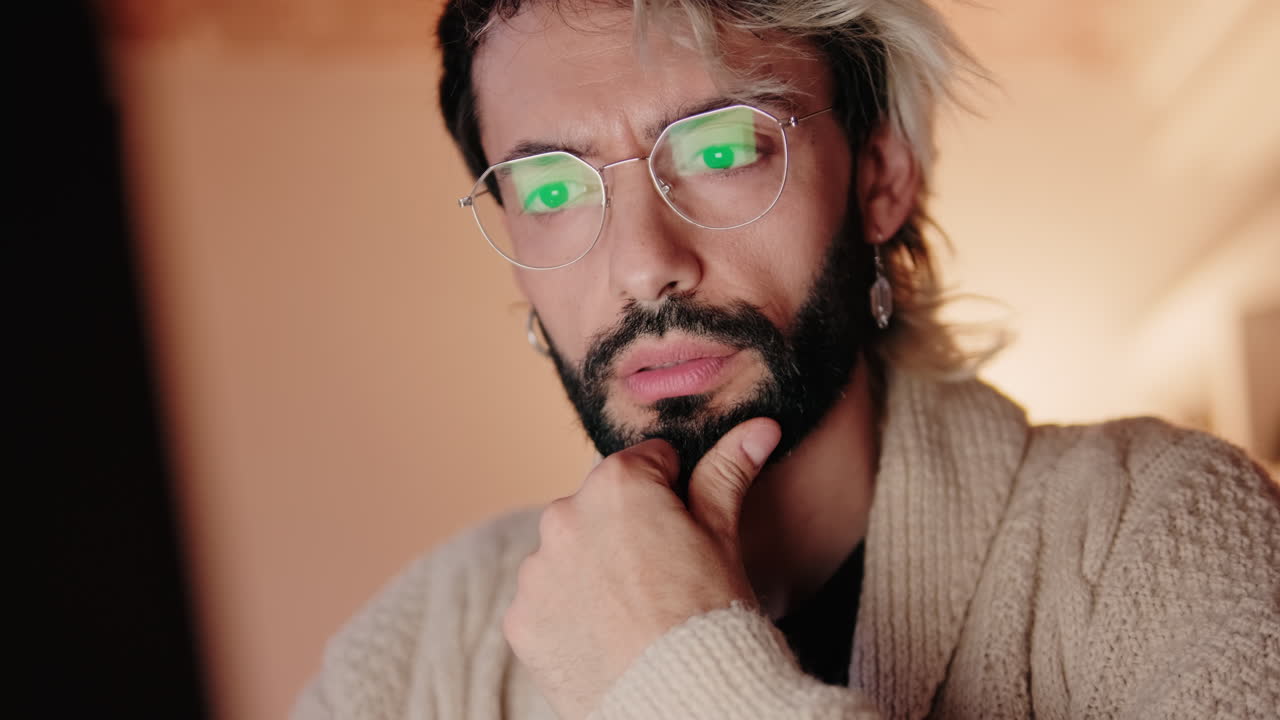 Gay Couple at Home Working on Computer