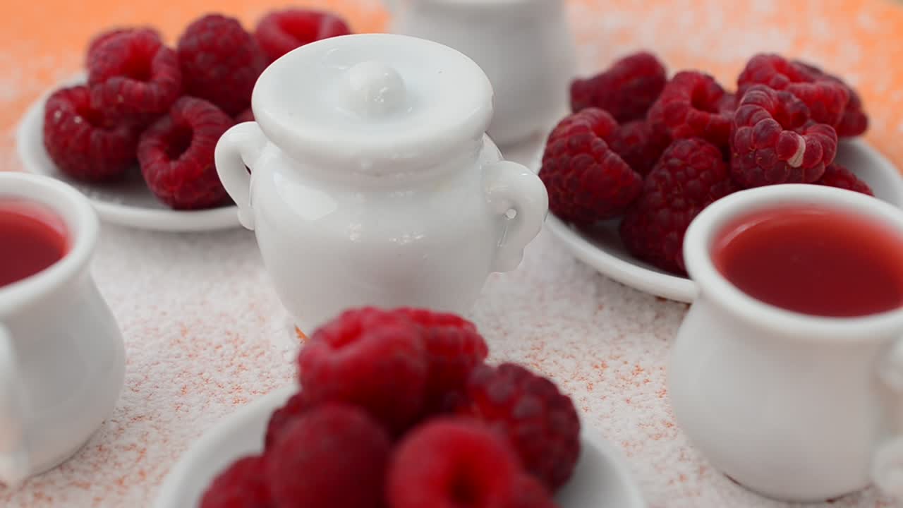 Rotation shot of Raspberry and jam, still life. Shooting in the movement