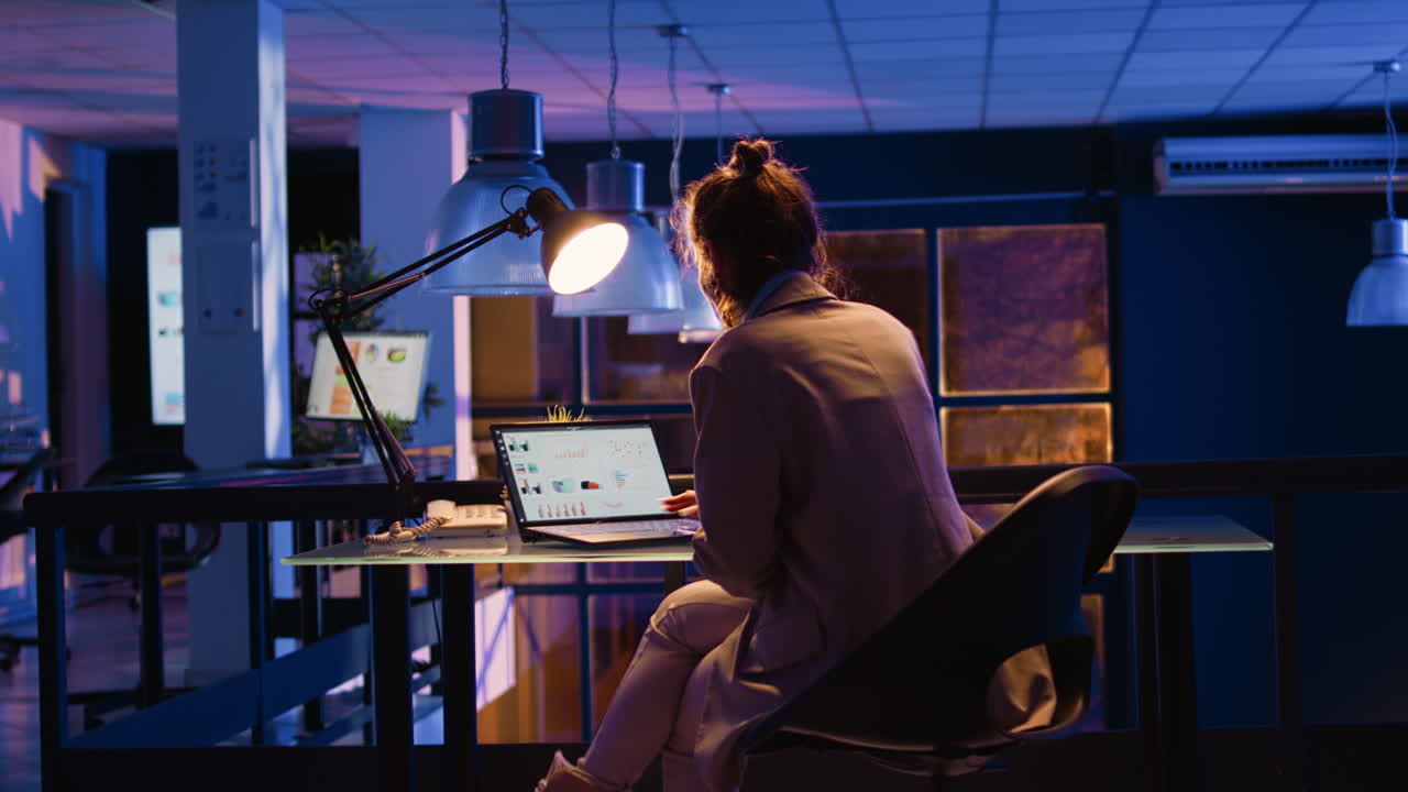 Office Space with Laptop and Desk Lamp