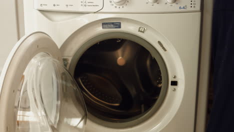 man fixing the washing machine