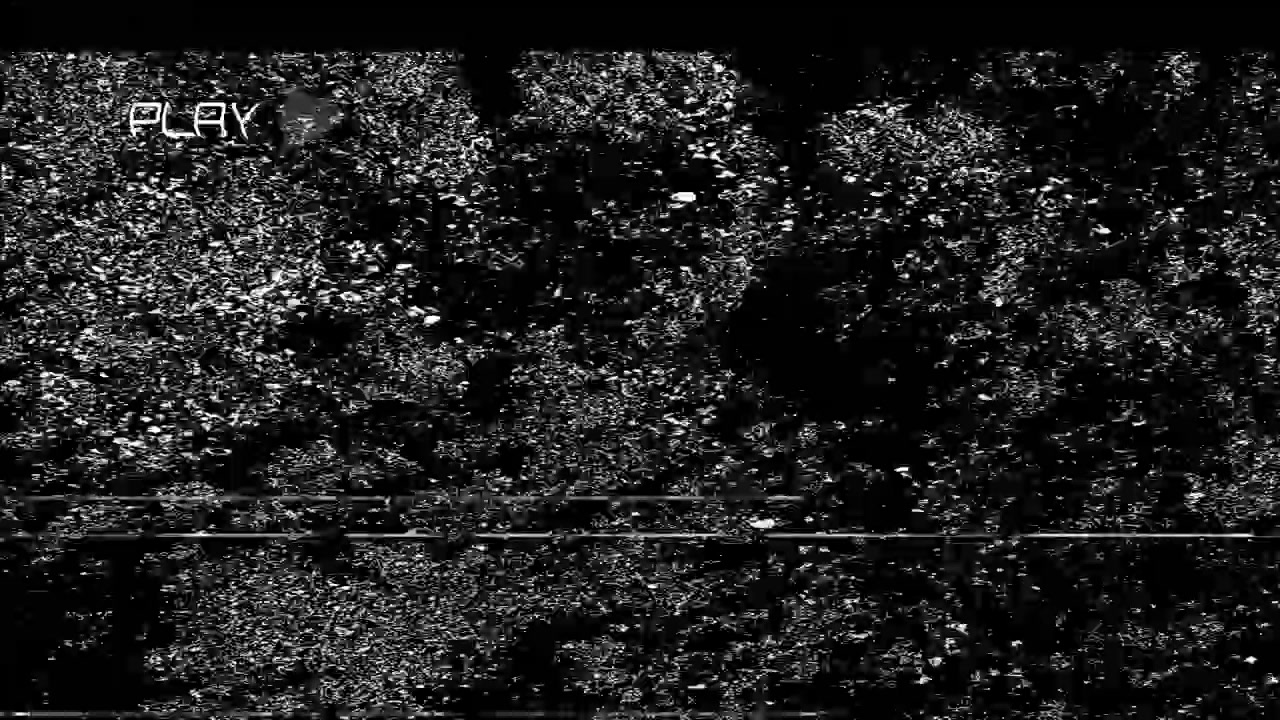 Pulsante "Play" VHS retrò con effetto neve tremolante e glitch