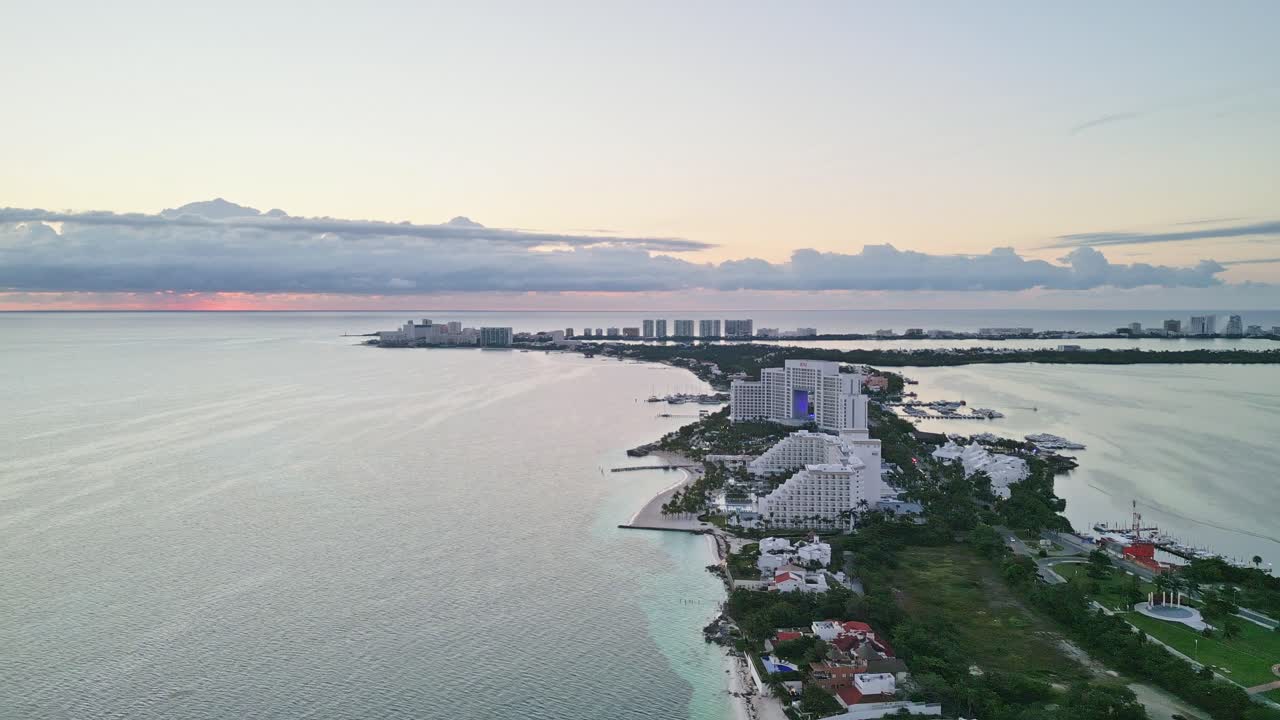 Aerial shot of Playa Langosta in Cancun, showcasing white sandy beaches and coastal resorts