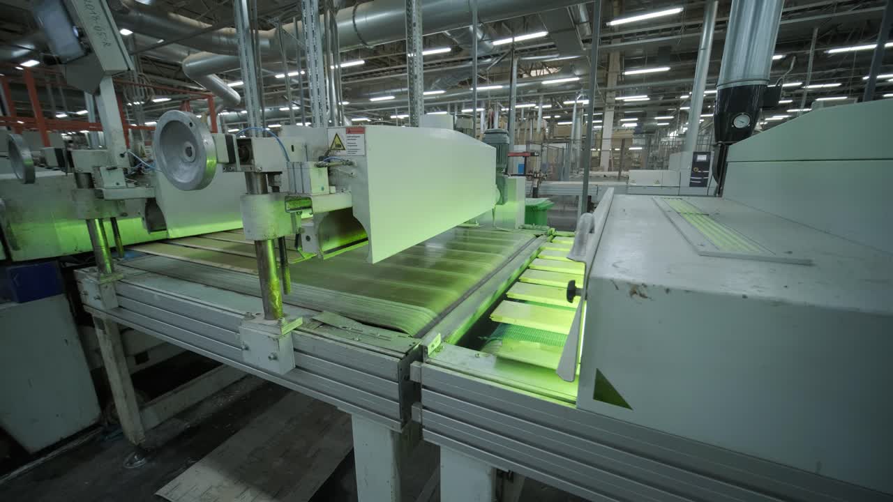 Automated Wood Planks Moving on Conveyor Belt in Industrial Factory