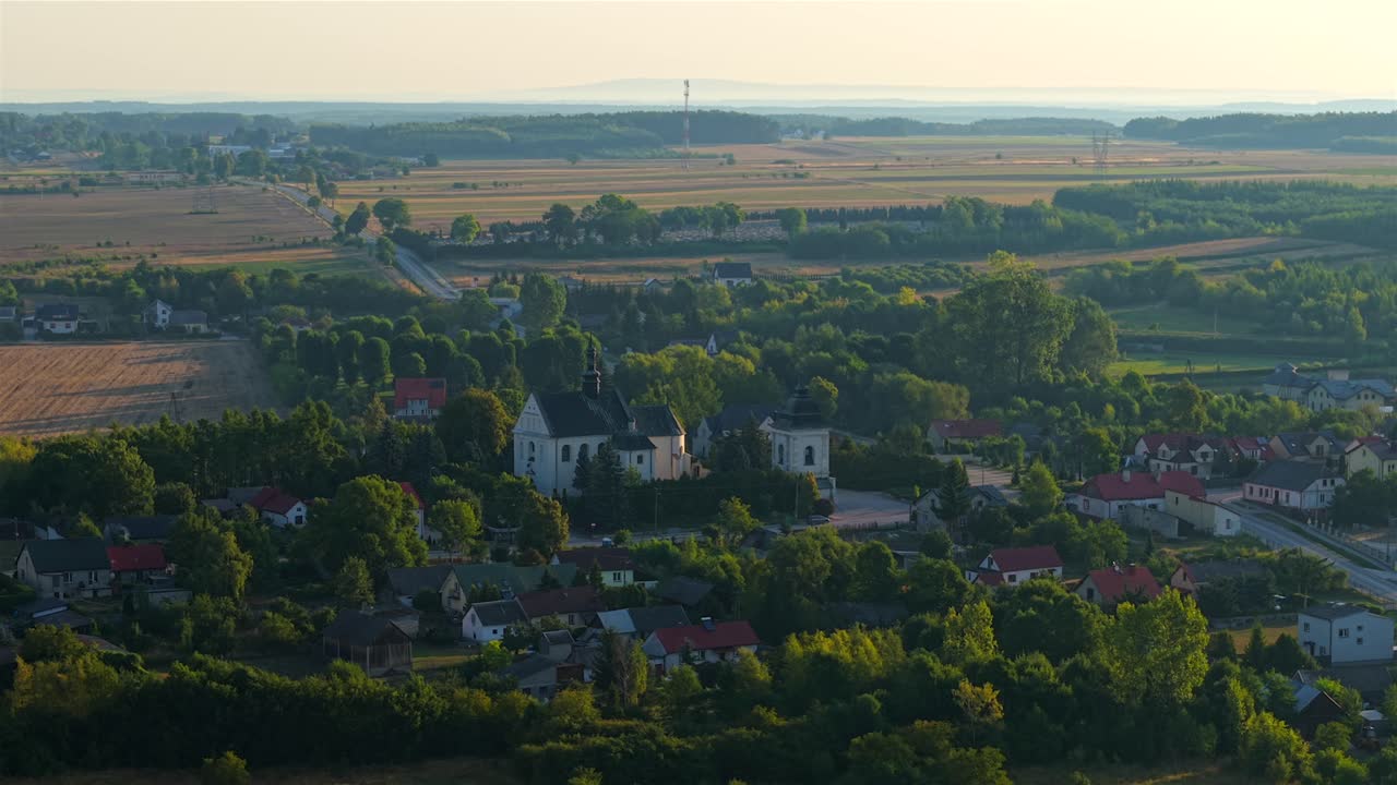 Aerial view of Kije village and Church of Saints Peter and Paul, Poland