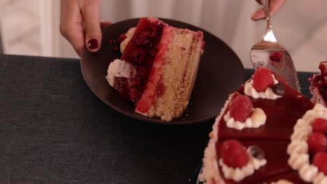 young girl puts a piece of wedding cake in a saucer