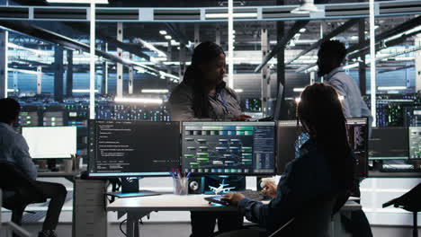 data center manager supervising technician using node tree software